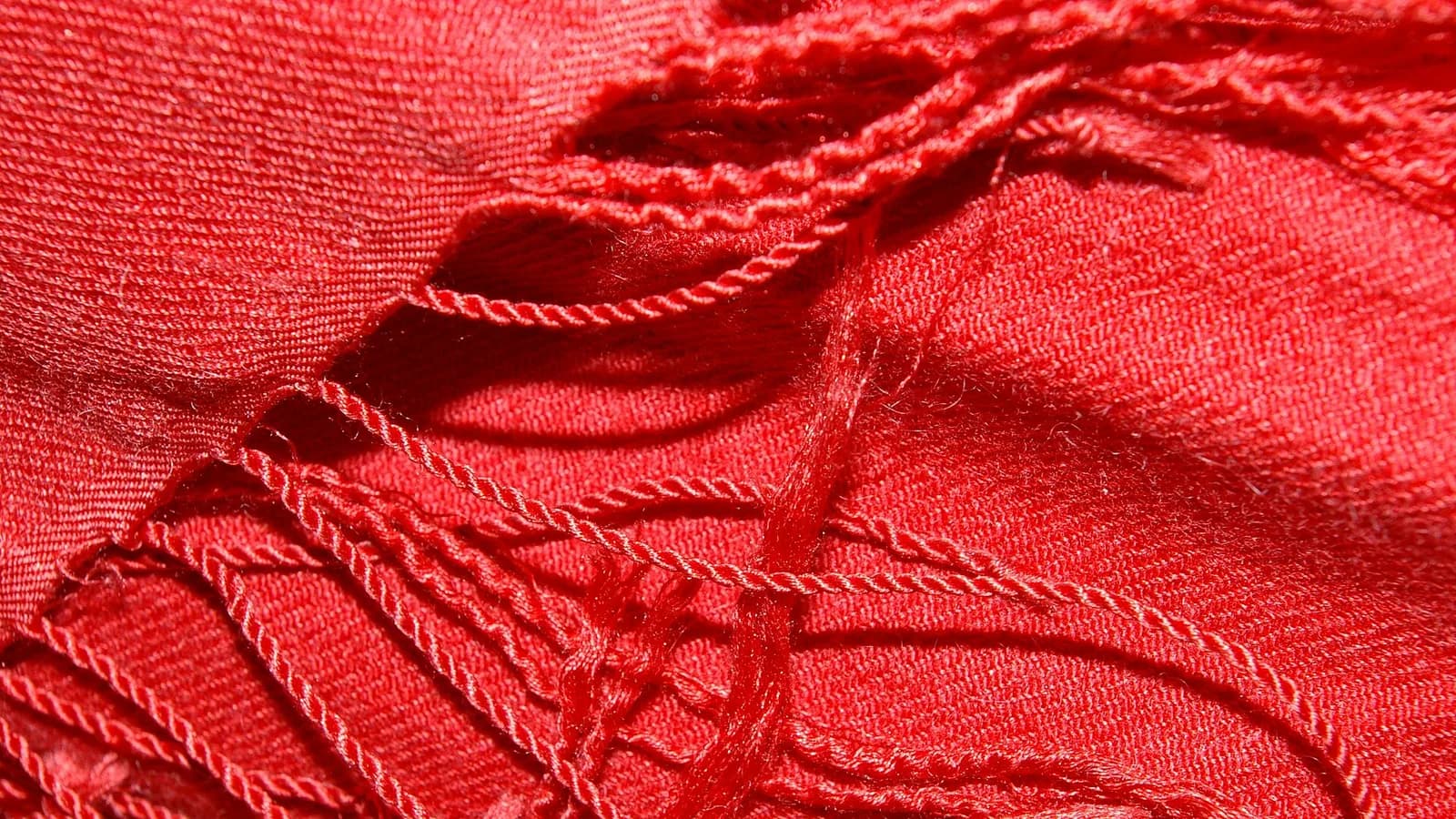 Stacks of folded pashmina shawls in many colours, among the best things to buy in Nepal