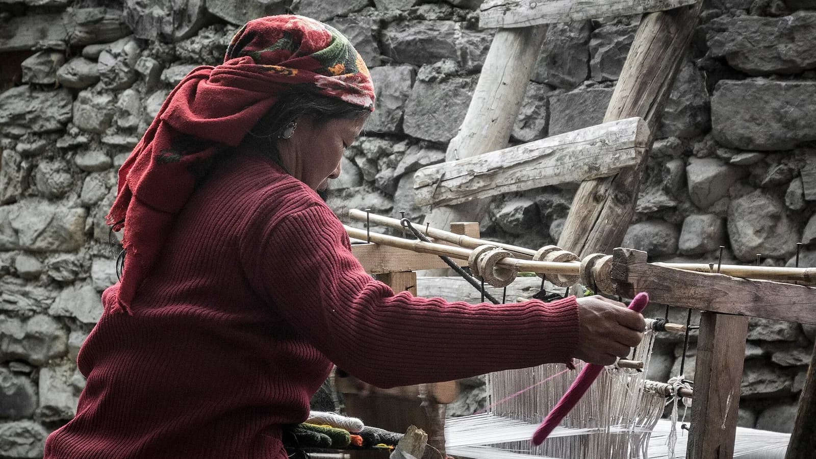 Traditional hand spinning of cotton thread, the raw material behind Nepal's handwoven Dhaka cloth