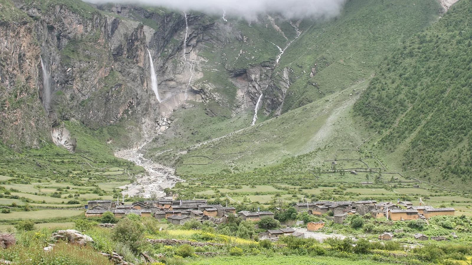 Green hills and waterfalls in the Manaslu region of Gorkha District, the Nepali homeland that gave the Gorkha soldiers their name