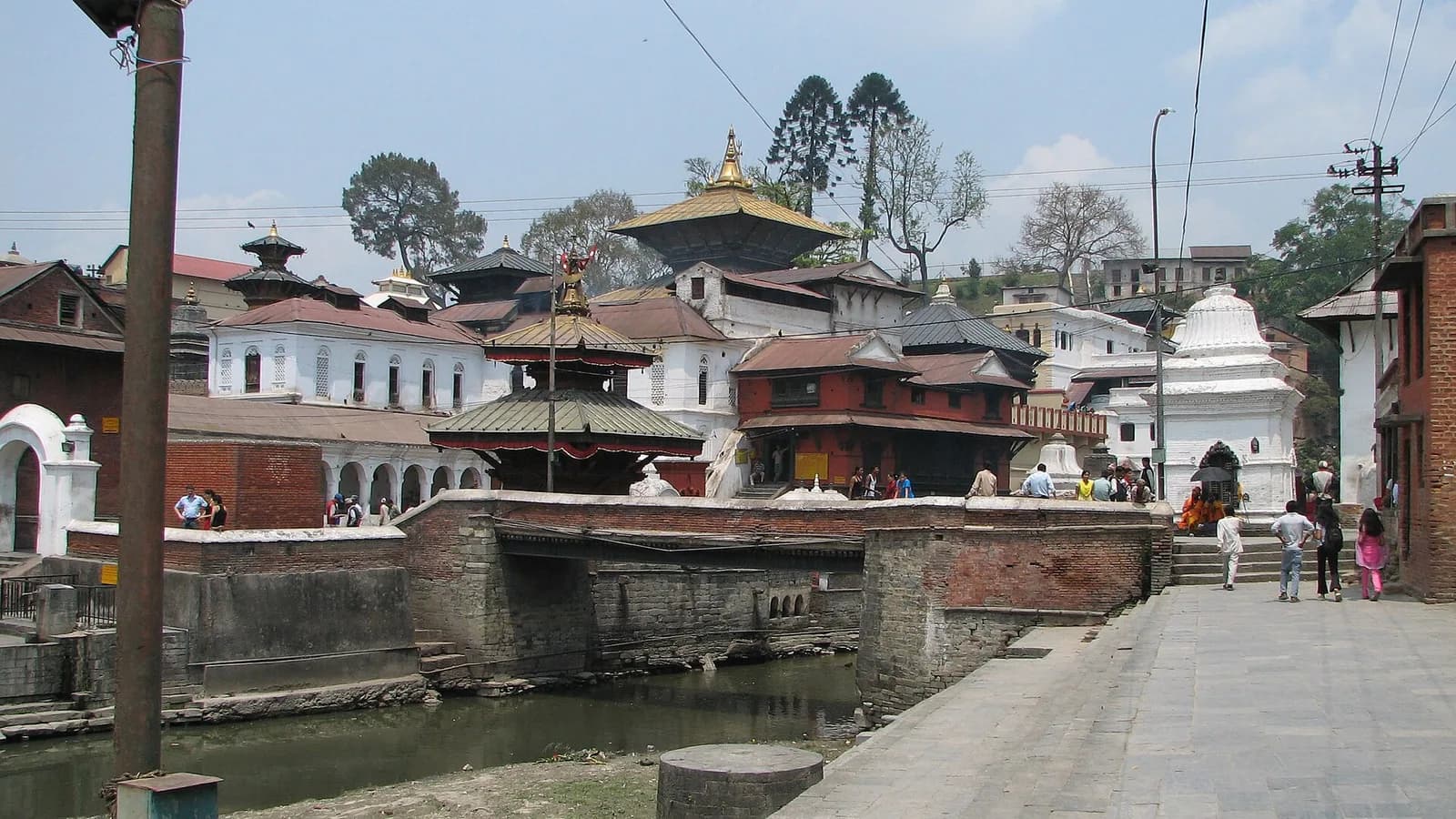 The tiered golden pagoda roofs of Pashupatinath, Nepal's holiest Shiva temple, on the banks of the Bagmati river in Kathmandu