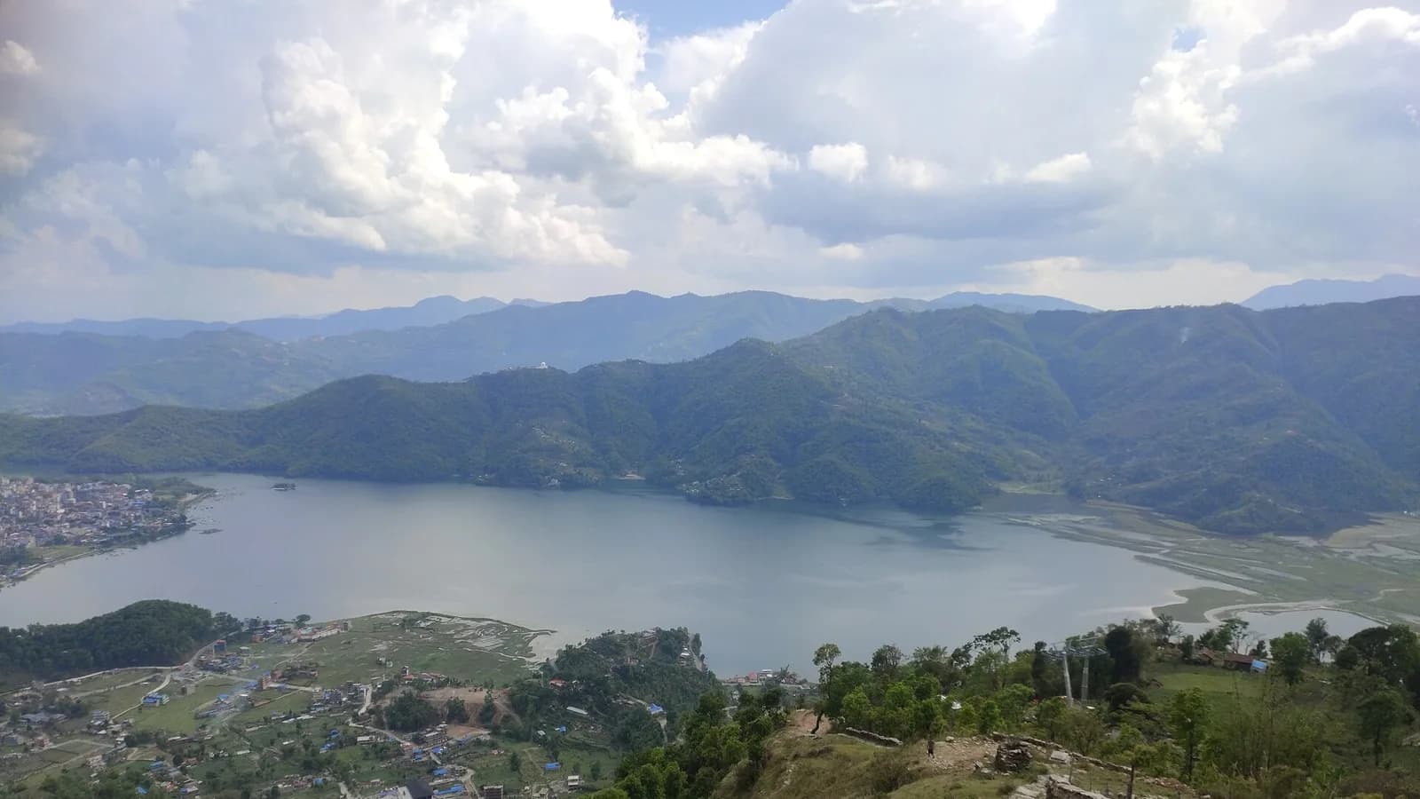 The winding Prithvi Highway through the green hills that tourist buses follow between Kathmandu and Pokhara