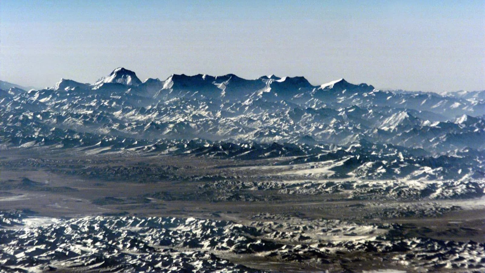 The Dhaulagiri and Annapurna Himalayan range under clear skies, the backdrop of the Khopra Ridge trek