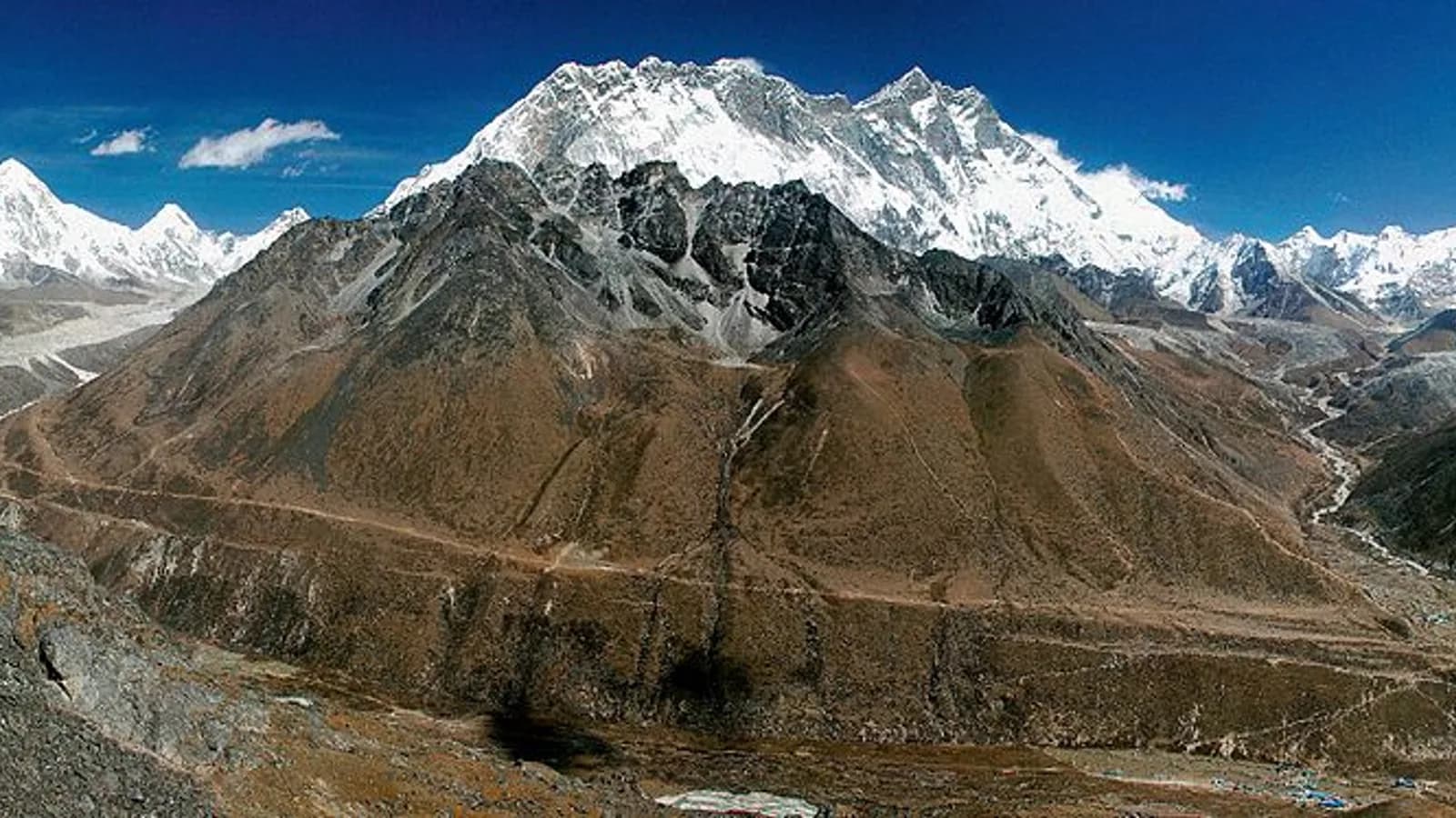 Snow and ice of the Khumbu glacier below high peaks in Nepal's Everest region near Lobuche