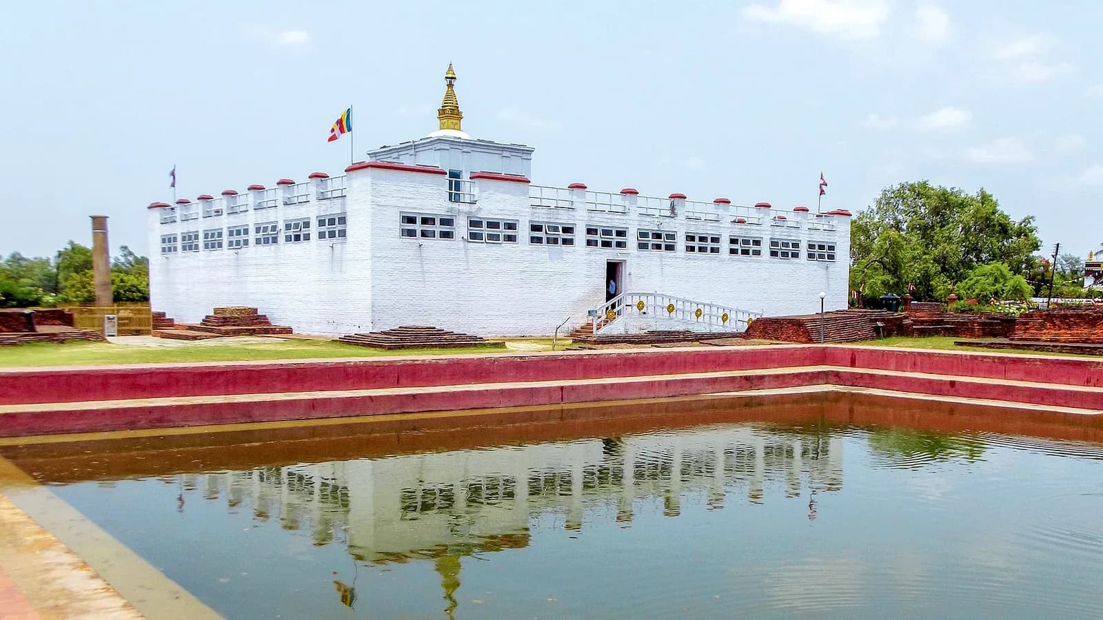 The white Maya Devi Temple in the Sacred Garden at Lumbini, marking the birthplace of the Buddha