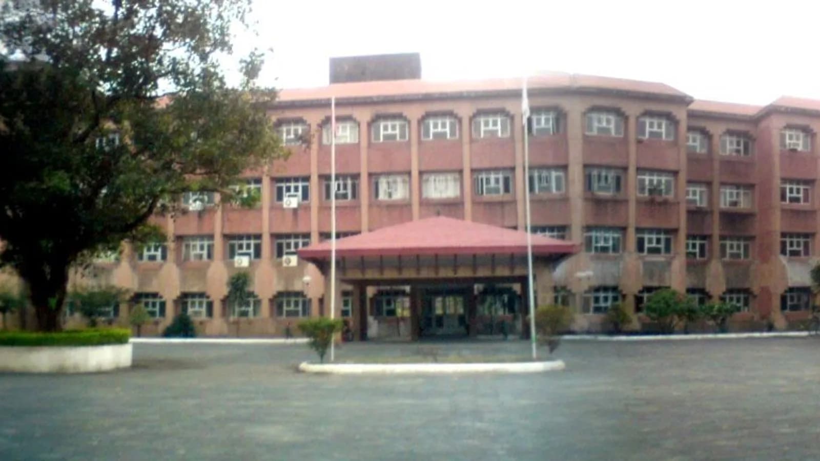 The campus building of a medical college in Nepal under a clear sky