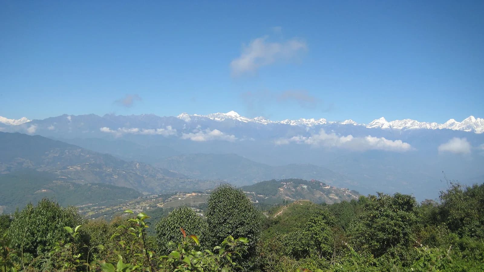 Golden sunrise light on Himalayan peaks seen from the Nagarkot ridge near Kathmandu