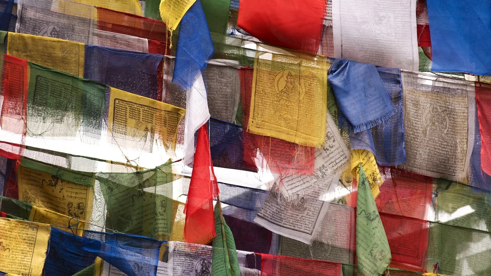 Colourful prayer flags fluttering in Nepal, a familiar sight across the country