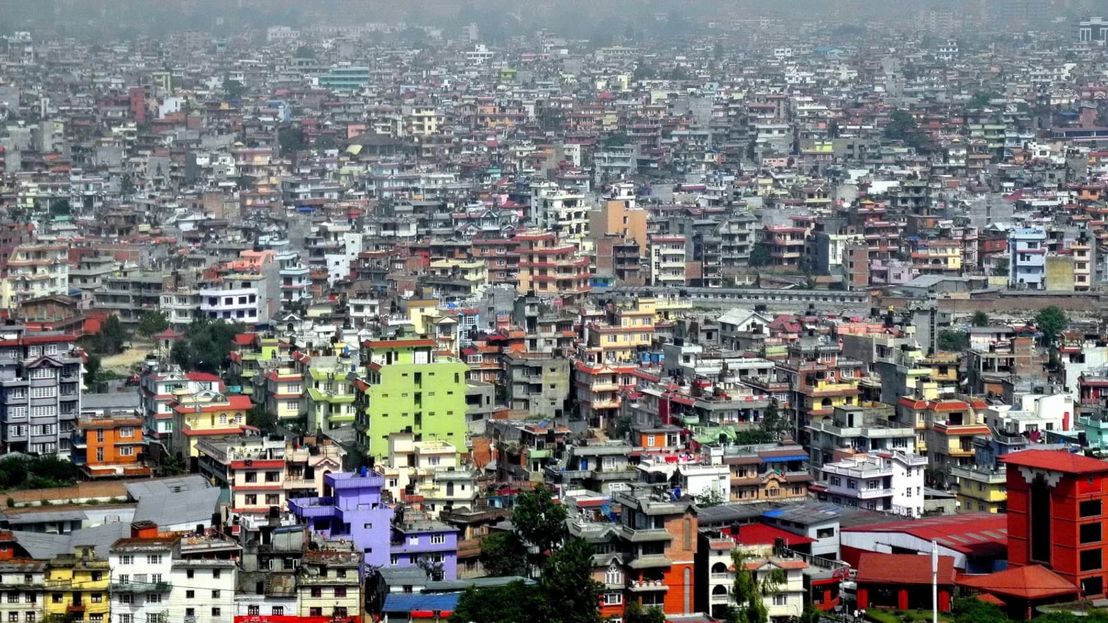 The painted Buddha eyes on the golden tower of Boudhanath Stupa in Kathmandu