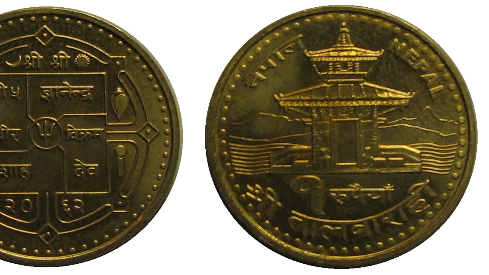 Nepalese rupee paper banknotes laid out, showing the printed designs
