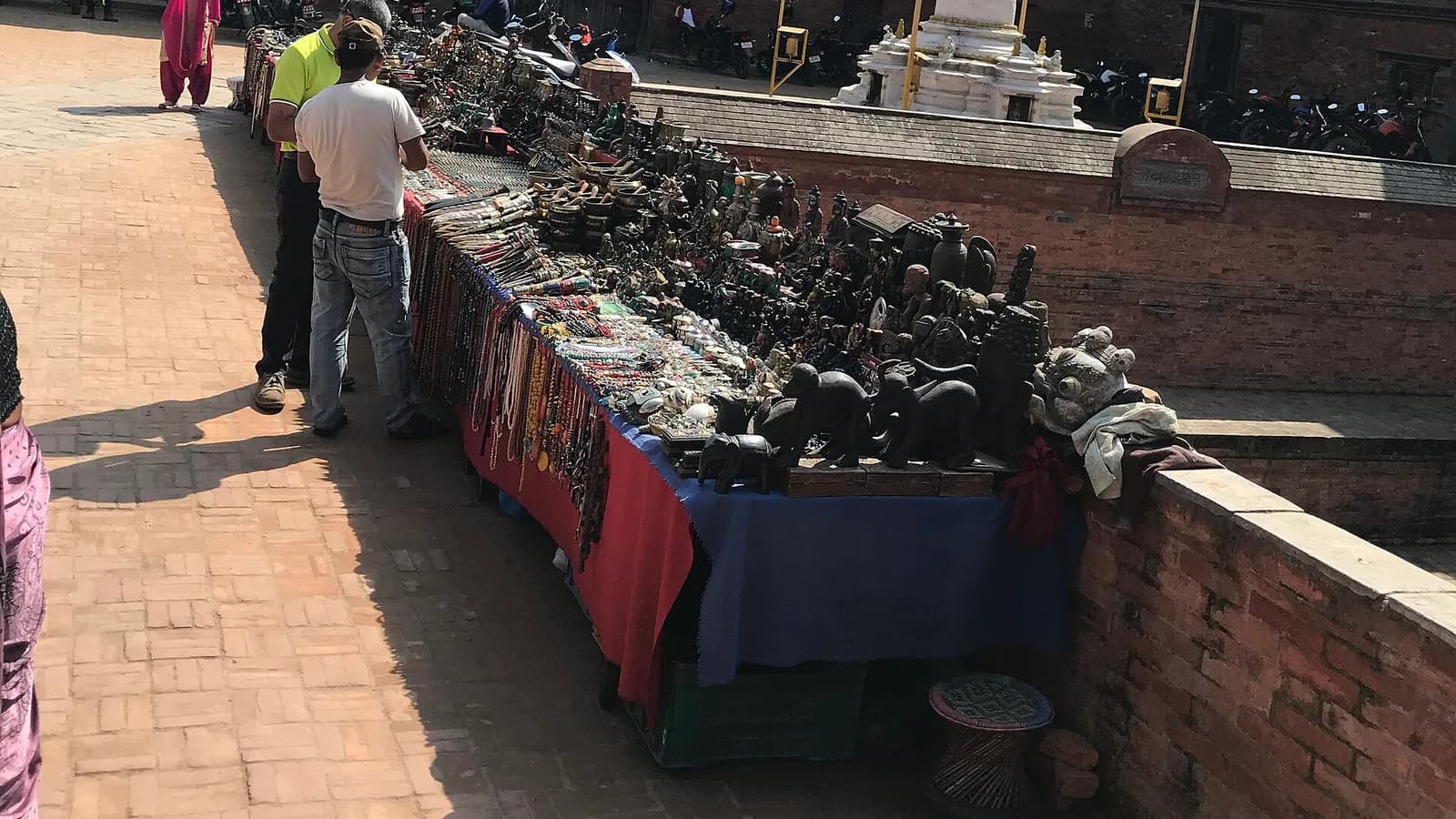 A handicrafts vendor's stall on the edge of Patan Durbar Square in the Kathmandu Valley