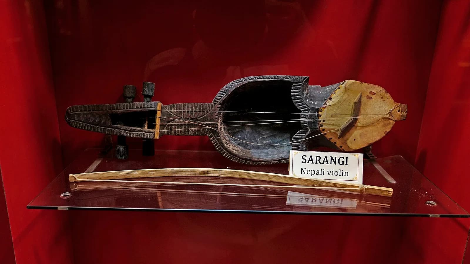 A sarangi, the bowed string instrument that traditionally accompanies Nepali folk singers, on display