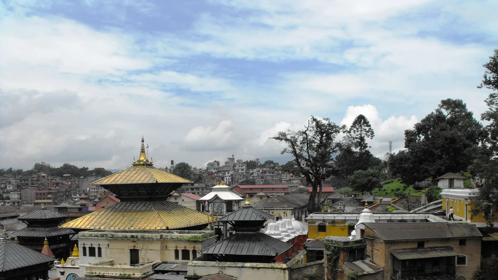 The gold-roofed pagoda of Pashupatinath Temple rising above the temple complex in Kathmandu