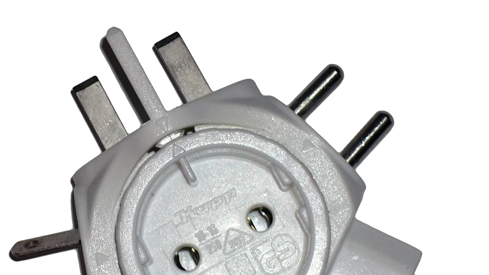 A universal travel power adapter with interchangeable plug heads