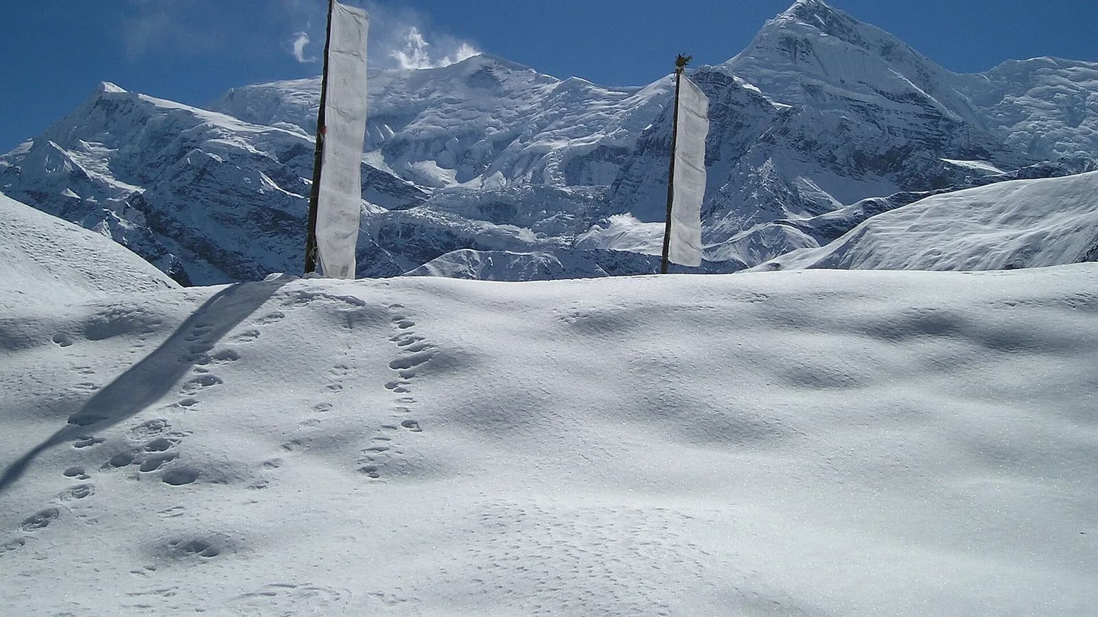 The Ama Dablam ridge above the Phortse-Pangboche trail in Nepal's Everest region, the kind of high-altitude terrain where rescue depends on insurance